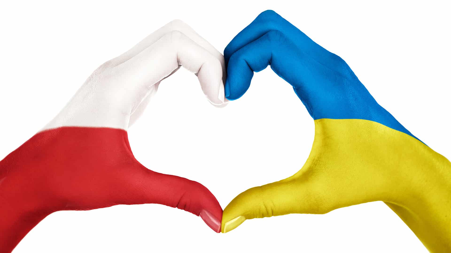 Hænder formet til et hjerte malet i de polske og ukrainske flagfarver, der symboliserer enhed i softwareudvikling.